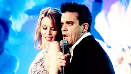 Robbie Williams amuzat de goliciunea lui Kylie Minogue