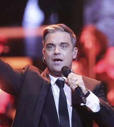 Robbie Williams şi-a scos obiectele personale la licitaţie