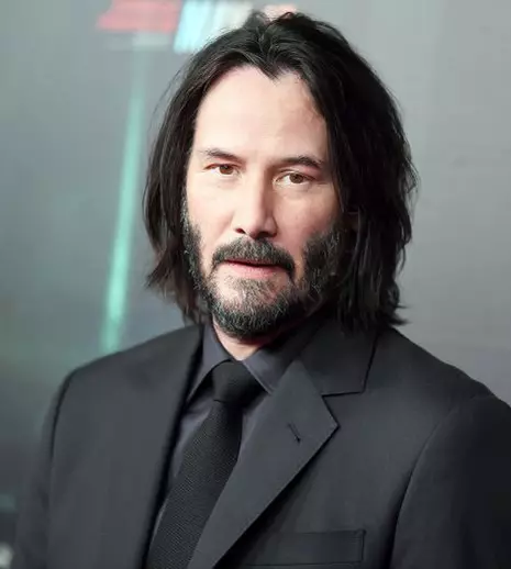 FOTO. Keanu Reeves prima apariție din carieră alături de iubita sa pe covorul roșu. Cine îi este parteneră