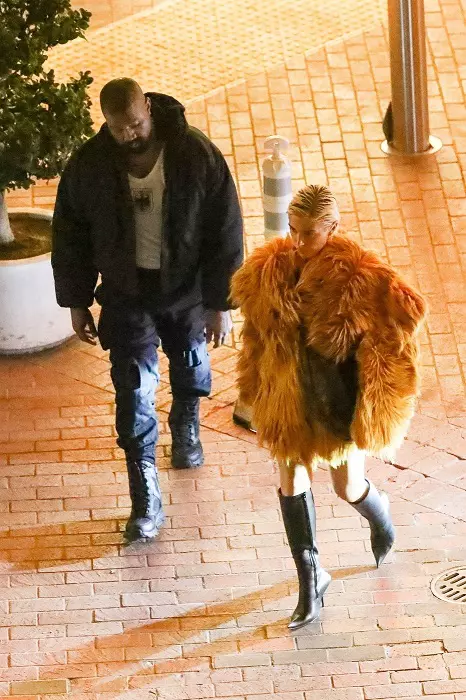 *PREMIUM-EXCLUSIVE* Kanye is not canceling Balenciaga! Rapper takes wife Bianca Censori on a shopping spree to disgraced brand's store despite recent ad campaign scandal. Is that the coat of arms for the German Reich?