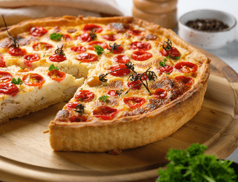 Tartă cu brânză, smântână şi roşii cherry. Cum se prepară aperitivul perfect pentru vară