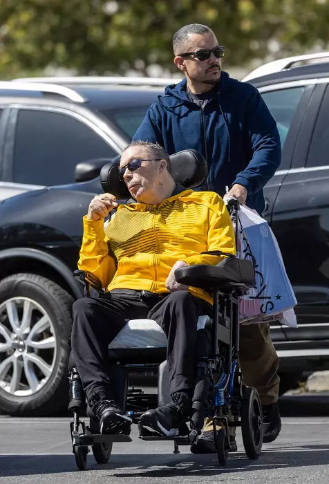 EXCLUSIVE: Smoke Show! Legendary Actor Tim Curry Looks Cool In Yellow Track Jacket While Smoking A Cigarette As He Celebrates His 78th Birthday In LA - 18 Apr 2024