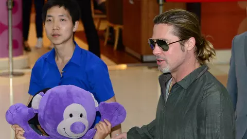 Pax promovează filmul lui tati Brad Pitt