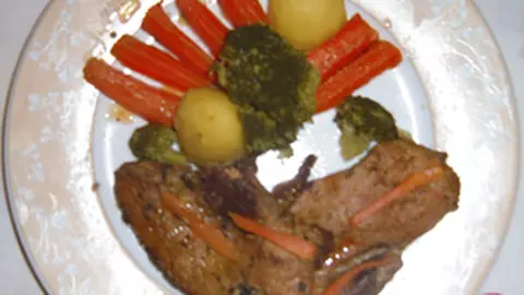 Muschi de porc cu sos rubiniu