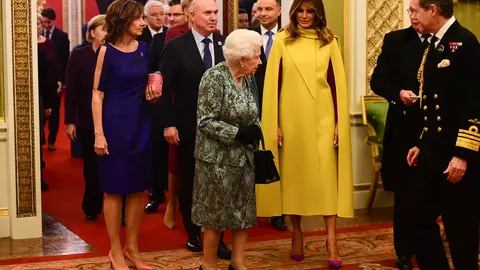 Ce ținute au purtat Primele Doamne la recepția oferită de Regina Elisabeta a II-a în onoarea șefilor de stat și de guvern care participă la Reuniunea NATO