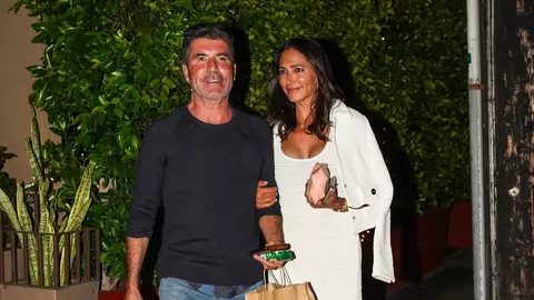 Simon Cowell s-a logodit cu Lauren Silverman după 13 ani de relație