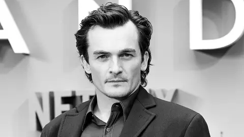 Rupert Friend se alătură lui John Malkovich în distribuția filmului Cravata Galbenă