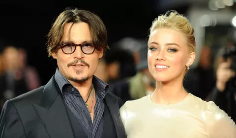 Johnny Depp pretinde că Amber Heard și-a falsificat vânătăile de pe față cu machiaj, pentru a-l acuza de violență domestică
