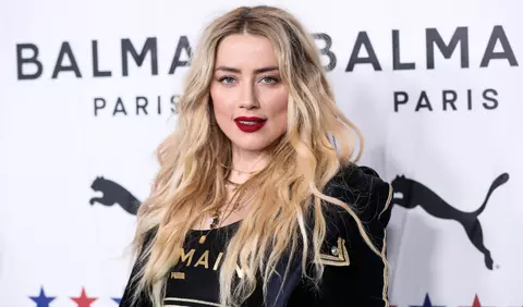 Amber Heard a fost fotografiată sărutându-se cu o cunoscută producătoare de film
