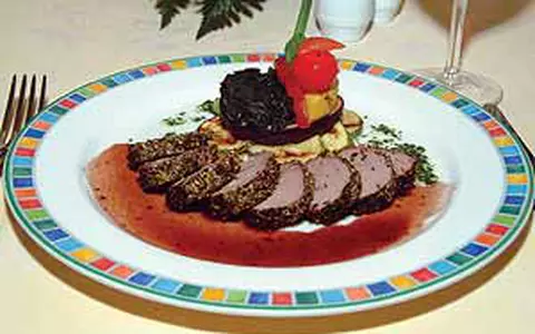 Muschiulet de porc in crusta de ierburi