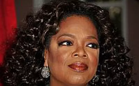 Oprah si Michelle Obama impart aceeasi coperta