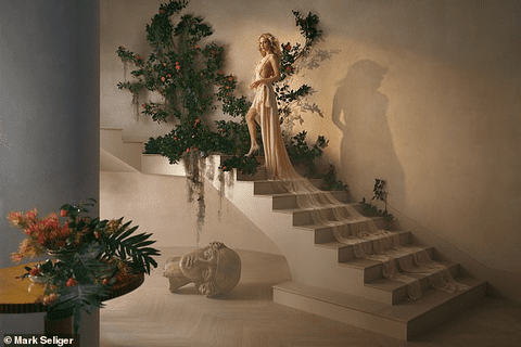 Poppy Delevingne poartă o rochie rafinată marca Maria Lucia Hohan pentru ședința foto Whiteley Regeneration