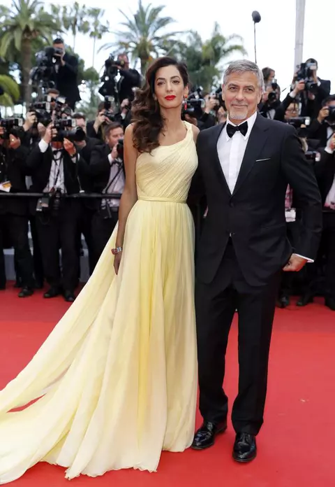 Amal şi George Clooney au devenit părinţi. Povestea lor de iubire în imagini