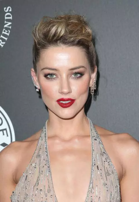Amber Heard, concediată după ce l-a acuzat pe Johnny Depp de violență domestică