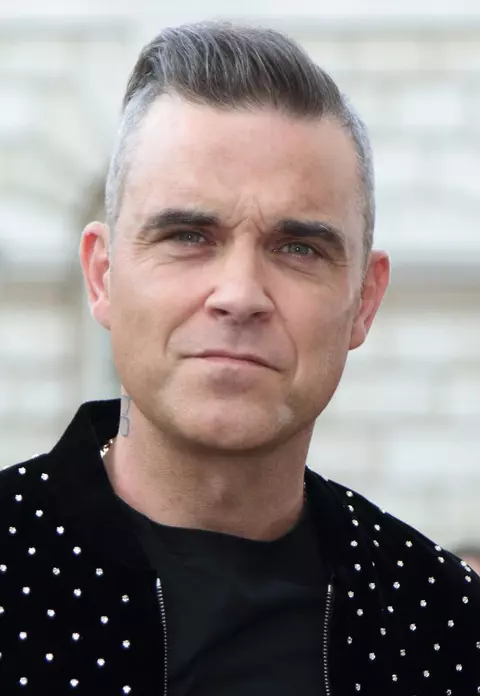 Surpriză de proporții pentru fani: Robbie Williams a devenit tată pentru a treia oară! De ce a păstrat secretul