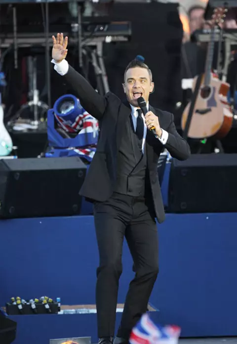Robbie Williams a devenit tata 