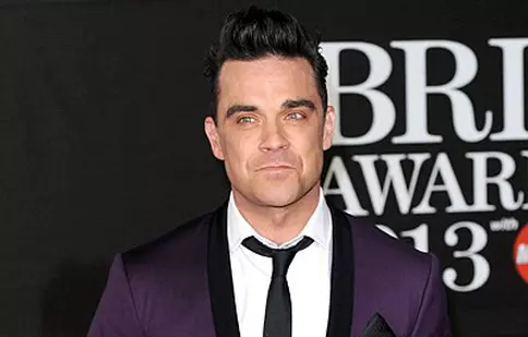 Robbie Williams învaţă cum să fie părinte
