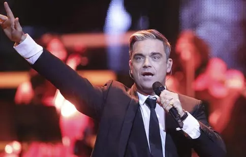 Robbie Williams şi-a scos obiectele personale la licitaţie