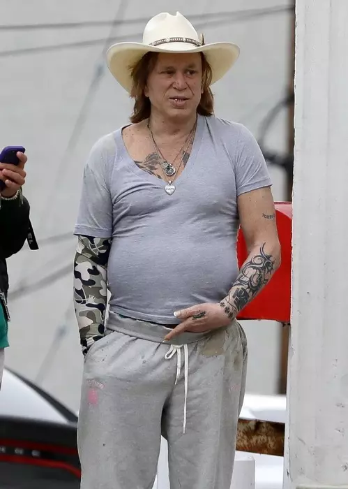 *EXCLUSIVE* A messy-looking Mickey Rourke gets a new tattoo on Sunset Blvd