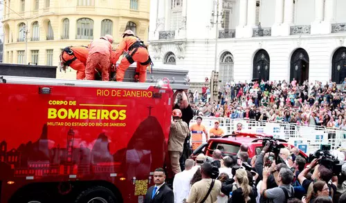 The Body Of The Singer Preta Gil Follows In Procession In A Fire Truck.
