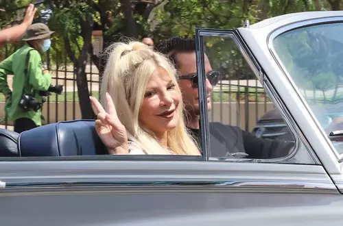 Tori Spelling meets up with Jay Leno and rides shotgun with Josh Flagg at the Beverly Hills 27th Annual Tour dElegance, Tori was seen without her wedding ring, earlier this week it was reported that Tori Spelling, Dean McDermott sleeping separately amid r