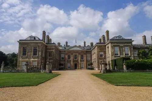 Althorp Park, Northamptonshire, UK. 1st July, 2021. Althorp House. Diana Princess of Wales is buried on the island in the centre of the lake at Althorp Park in Nottinghamshire, England. There is a plain stone monument on the island. Her grave is not visib