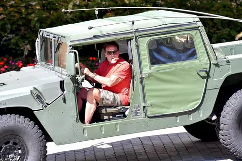 *EXCLUSIVE* Arnold Schwarzenegger running errands with his army jeep