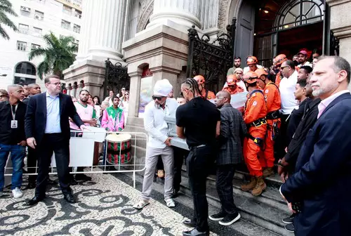 The Body Of The Singer Preta Gil Follows In Procession In A Fire Truck.