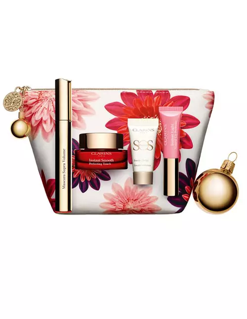 Set de machiaj Holiday Make-up Heroes, Clarins, 237 lei (conține Supra Volume Mascara full size, Instant Smooth Perfecting Touch full size, SOS Base Color Control 00 (sample), Instant Light Natural Lip Perfector 01 (miniatură))