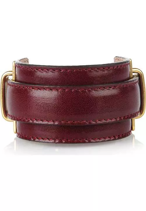 Bratara din piele, Alexander McQueen, 1.680 lei, magazinul Victoria 46