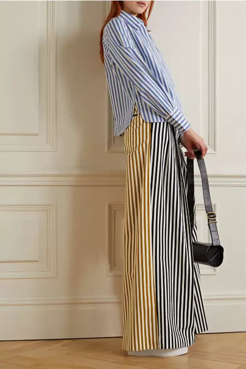 Pantaloni din bumbac, Partow, 1.277,13 euro, www.net-a-porter.com