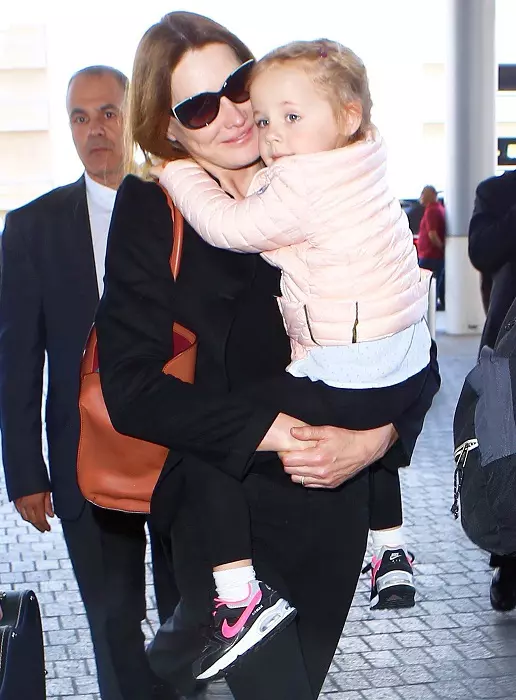 Carla Bruni catches flight with adorable daughter Giulia Sarkozy