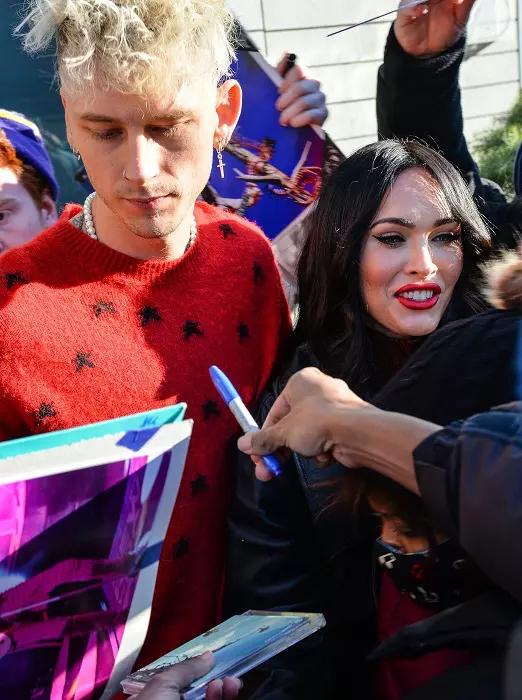 Meghan Fox and Machine Gun Kelly Are Swarmed By Fans Outside Their Hotel in New York City