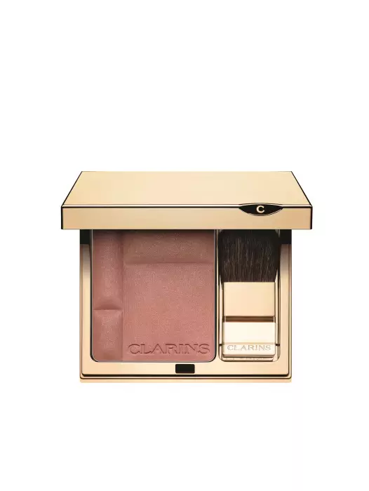 Fard de obraz iluminator Prodige CLARINS Acest fard de obraz mătăsos, sub formă de pulbere, conține o combinație perfectă de extracte de plante și minerale. Adaugă culoare, luminozitate și strălucire instantanee pentru un aspect sănătos.Paleta conține mai multe nuanțe pentru a-ți putea contura mai bine zona pomeților, care îți permite iluminarea tenului și accentuarea formelor naturale.