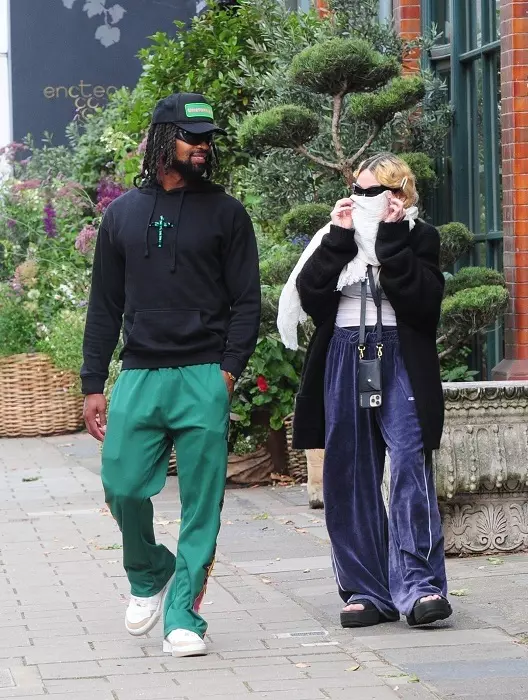 *PREMIUM-EXCLUSIVE* MUST CALL FOR PRICING BEFORE USAGE  - The legendary 'Queen of Pop' Madonna who had recently enjoyed a trip to Italy to celebrate her 66th birthday is spotted shopping with her beau Akeem Morris.
*PICTURES TAKEN ON 23/08/2024*