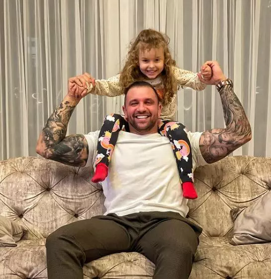 Alex Bodi și fetița ui