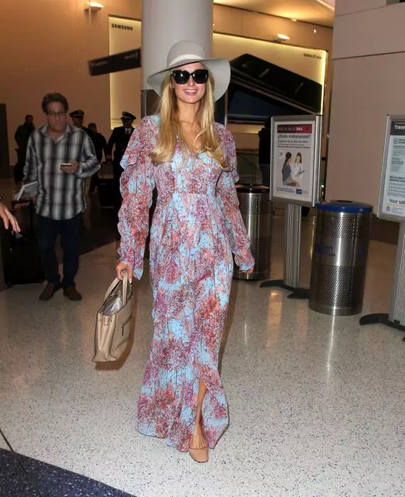 Paris Hilton Goes For A Spring Look While Heading Out Of LA