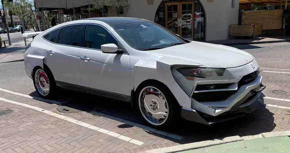 Recunoașteți modelul Honda din spatele acestui „Lamborghini Urus”?