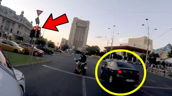 Scandalos! Mai mulți șoferi trec pe roșu, cu poliția de față. Ce făcea șoferul autospecialei