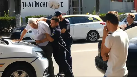 Poliția Română, în centrul unui nou scandal: Agentul agresează un șofer în vârstă