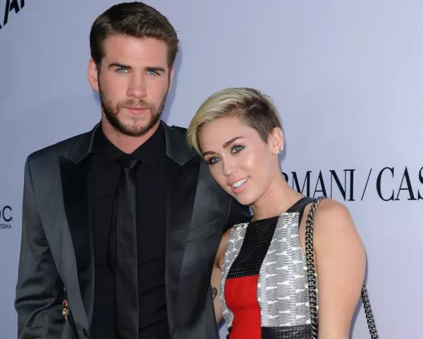 LIAM HEMSWORTH + MILEY CYRUS @ the premiere of 'Paranoia' held @ the DGA theatre.August 8, 2013