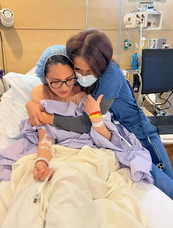 olivia pe patul de spital inainte de operatii