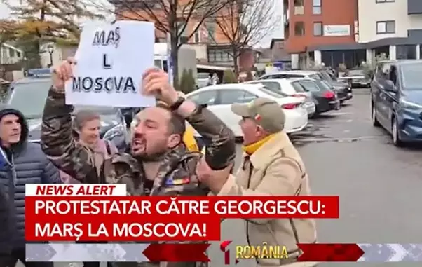 calin-georgescu-admonestat-de-un-barbat-la-alba-iulia-de-ziua-nationala-mars-la-moscova-1-e1764589346325