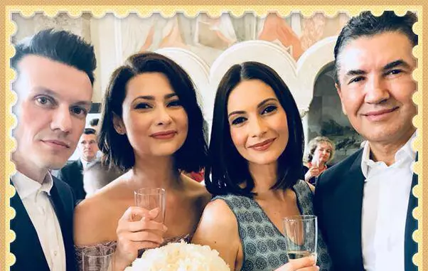 Mihaela Călin alături de soţul său şi de naşii lor