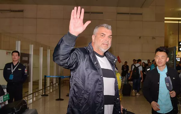 Jiang Suning new head coach Cosmin Olaroiu arrives at Nanjing