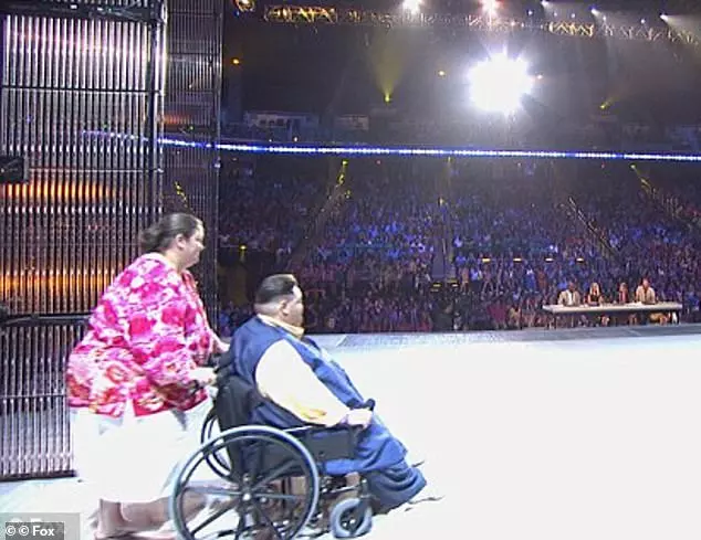 48011755-9998943-And_the_show_must_go_on_Here_Combs_was_seen_being_pushed_onto_th-m-13_1631815197538