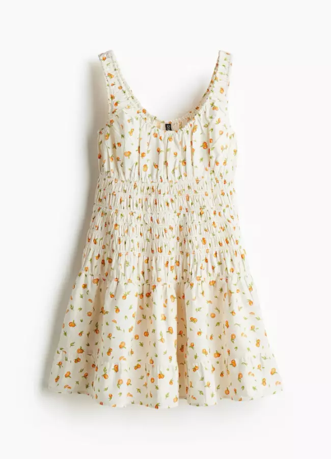 9. Rochie mini cu fronseuri și portocale, H&M
