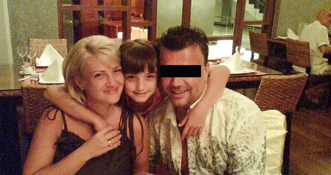 Corina și Adrian Enache, împreună cu fiica lor, Diana