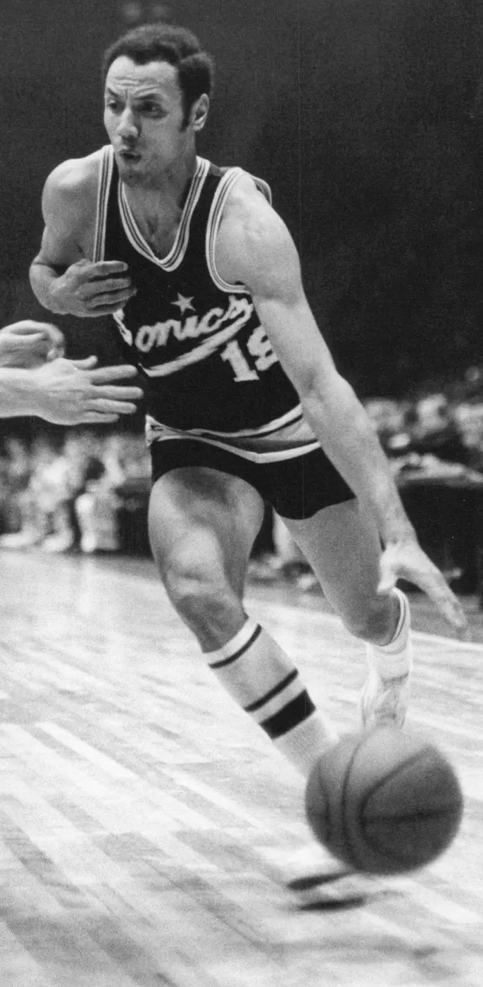 Lenny Wilkens, a professional basketball player, during the 1968 season. Wilkens played for multiple NBA teams and is known for his contributions as both a player and coach.