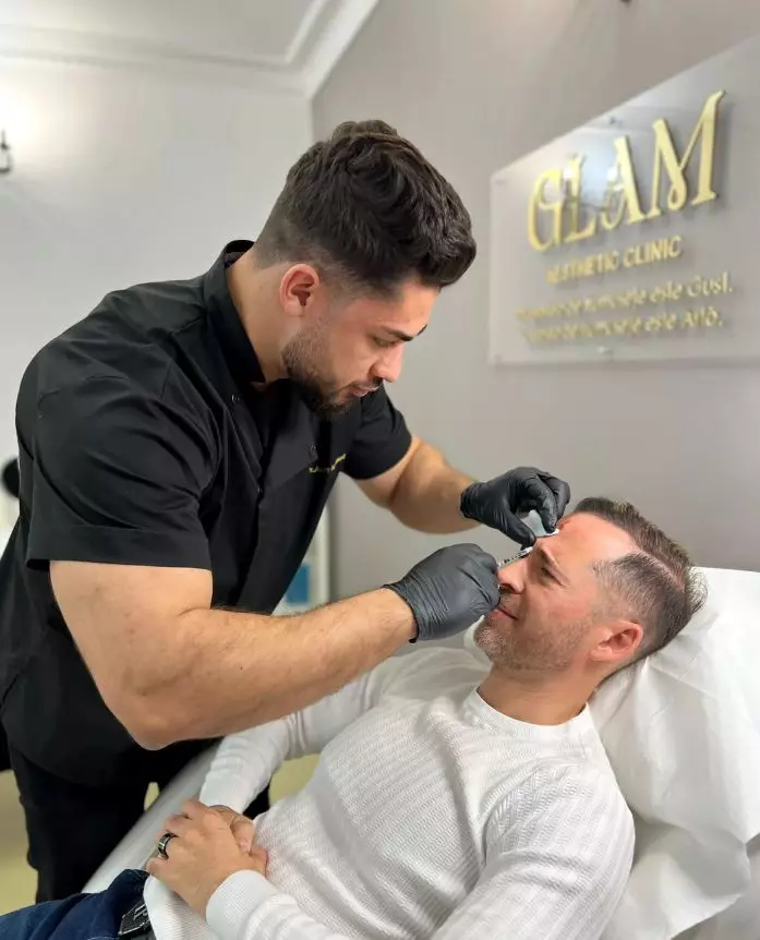 Dinu Maxer și medicul estetician Auday Al-Ahmad